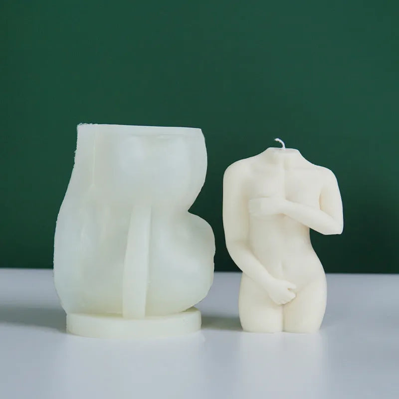 Silicone mould for making candles in the shape of a shy female body silhouette.