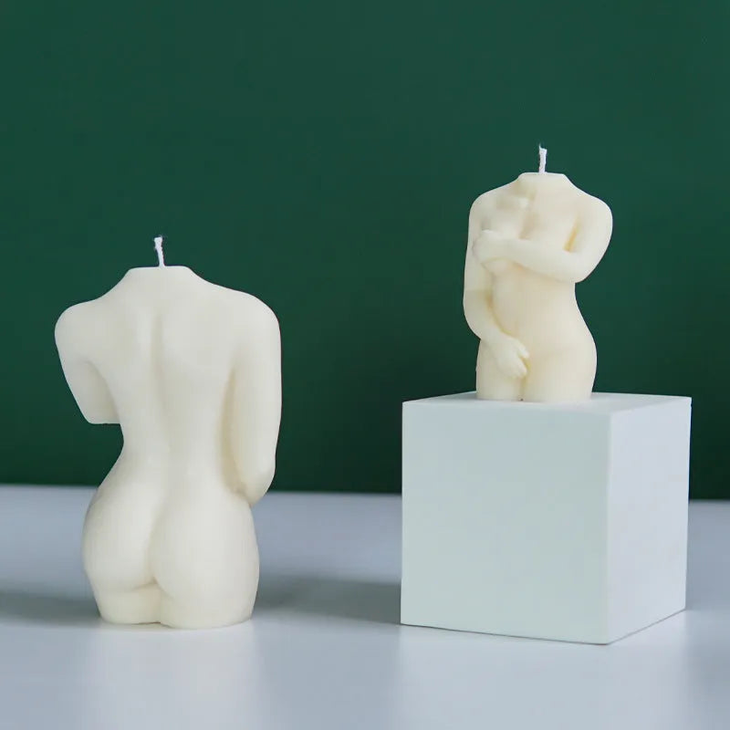 Silicone mould for making candles in the shape of a shy female body silhouette.