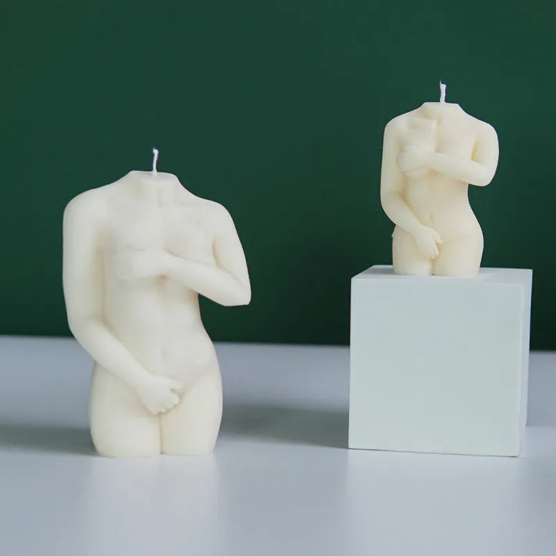 Silicone mould for making candles in the shape of a shy female body silhouette.