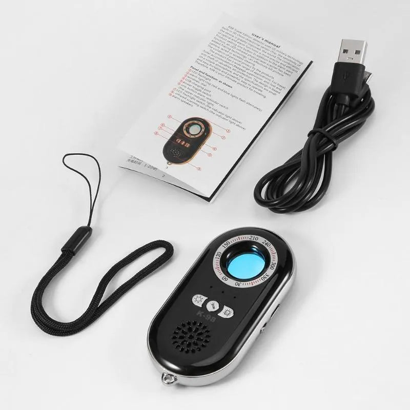 Compact black wireless signal detector with vibration alarm for camera detection and travel security