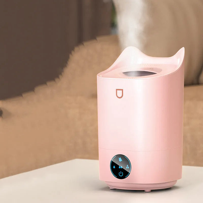 Coral Pink and Glacier White USB double spray humidifier with three mist outlets and large water tank.