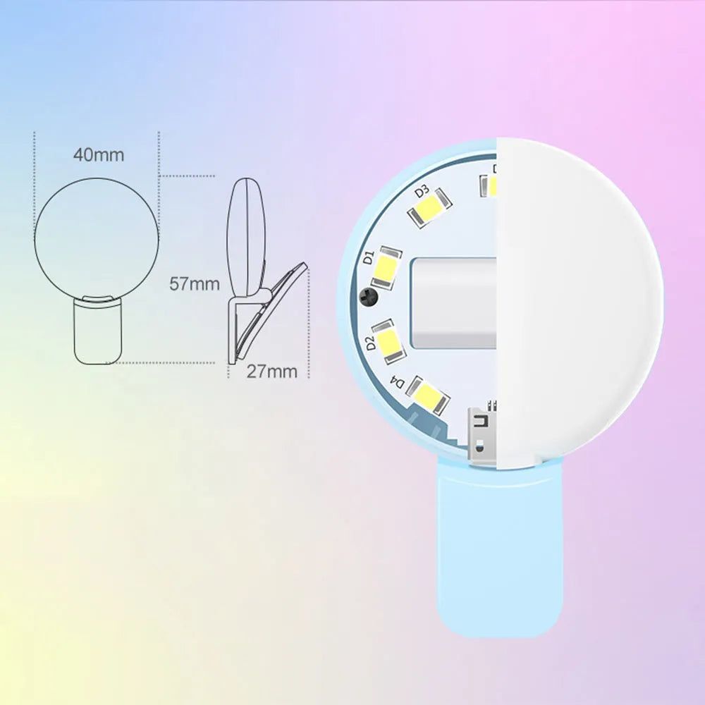 Small round clip-on LED fill light attached to a mobile phone, shown in four colour options.
