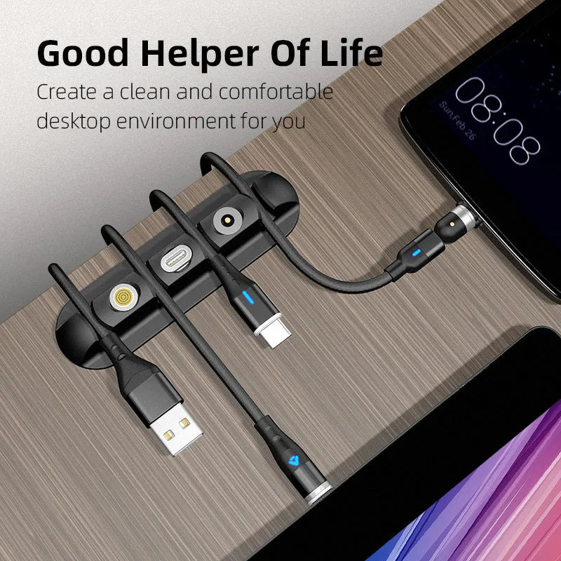 Black soft plastic magnetic charging base stand cable organiser for desktop use.