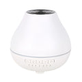 White round Bluetooth humidifier with aroma diffuser and night light functions