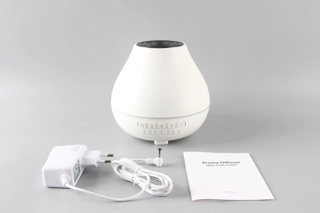 White round Bluetooth humidifier with aroma diffuser and night light functions
