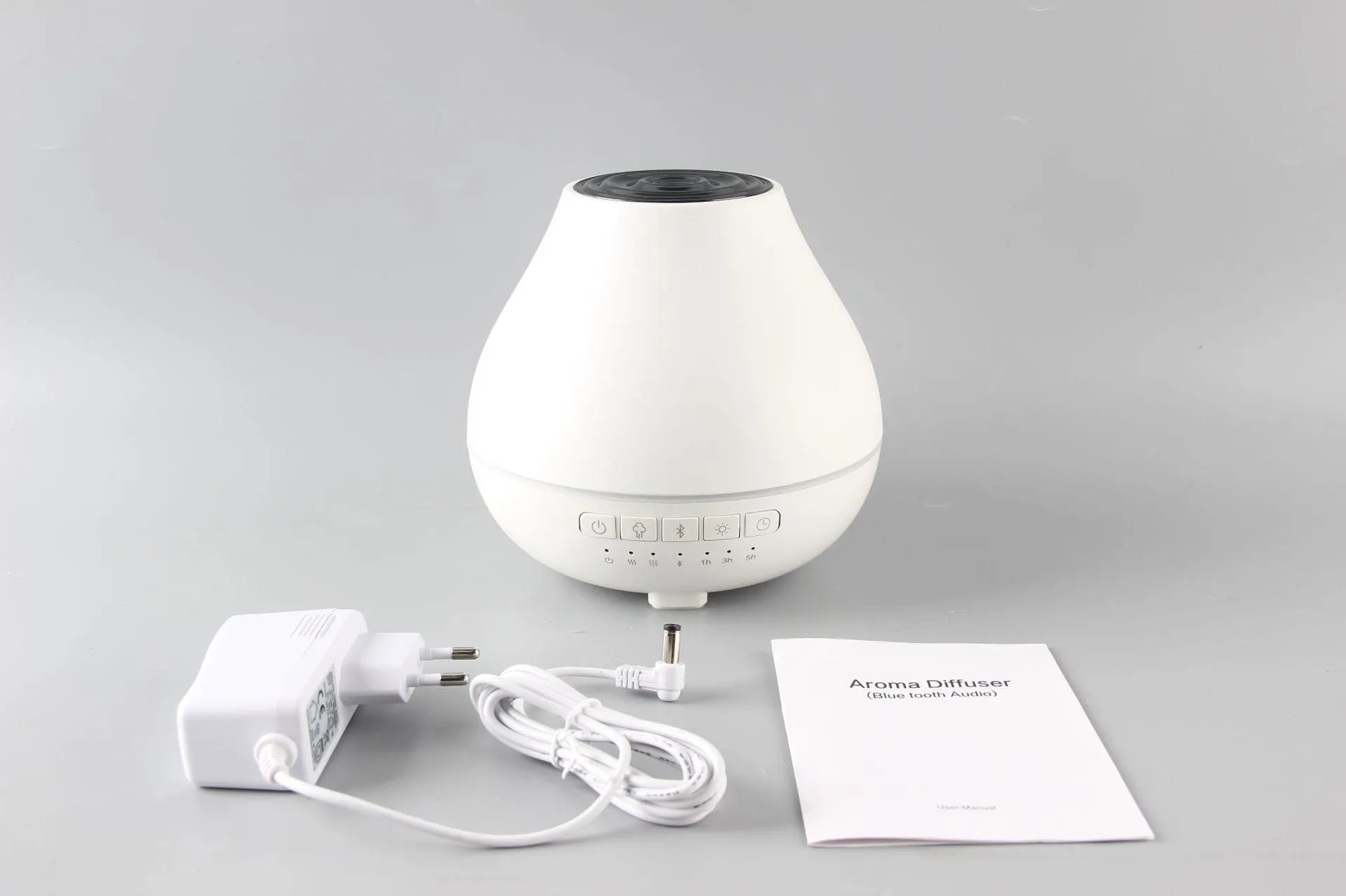 White round Bluetooth humidifier with aroma diffuser and night light functions