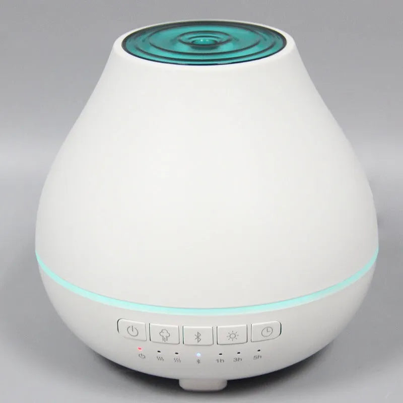 White round Bluetooth humidifier with aroma diffuser and night light functions