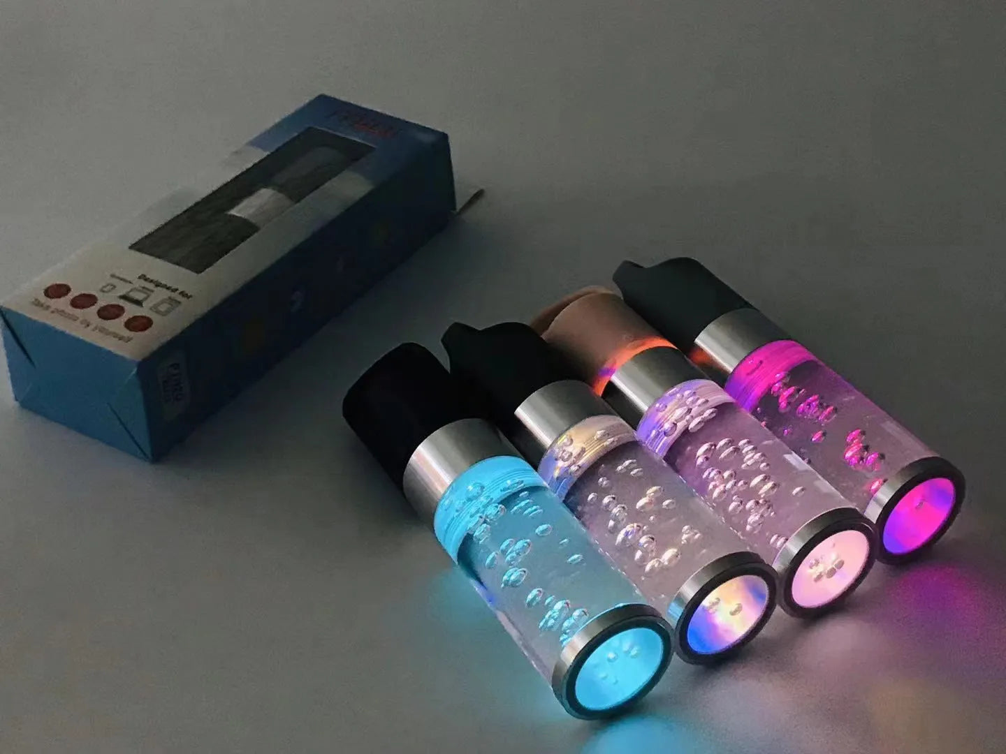 Portable Bluetooth speaker with colourful crystal light in pink colour with carrying handle