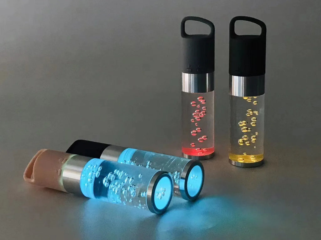 Portable Bluetooth speaker with colourful crystal light in pink colour with carrying handle