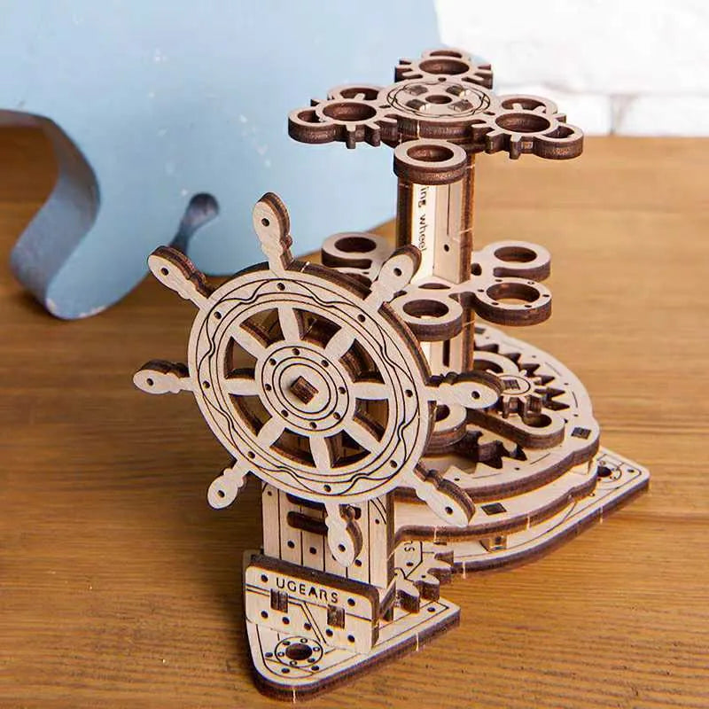 Ukrainian wooden rotating pen holder model kit with steering wheel mechanism