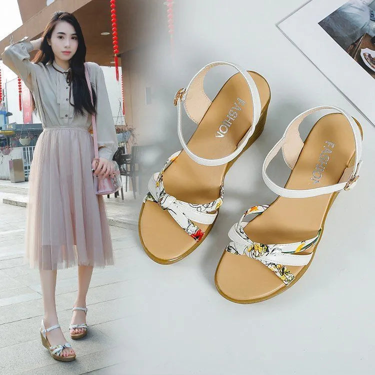Women's pink wedge sandals with a fish mouth open toe and a thick non-slip heel.
