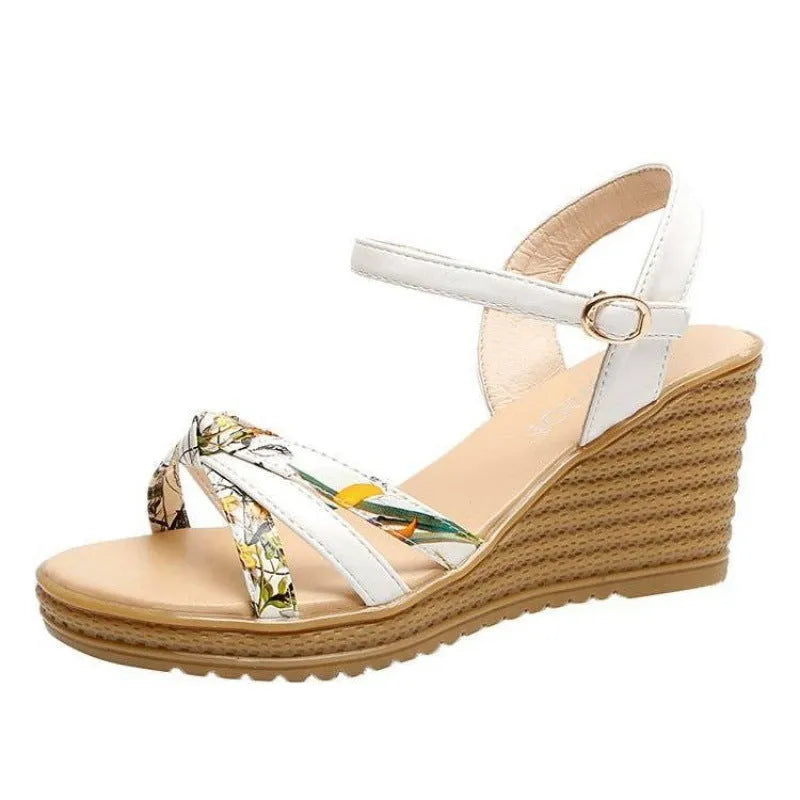 Women's pink wedge sandals with a fish mouth open toe and a thick non-slip heel.