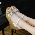 Women's pink wedge sandals with a fish mouth open toe and a thick non-slip heel.