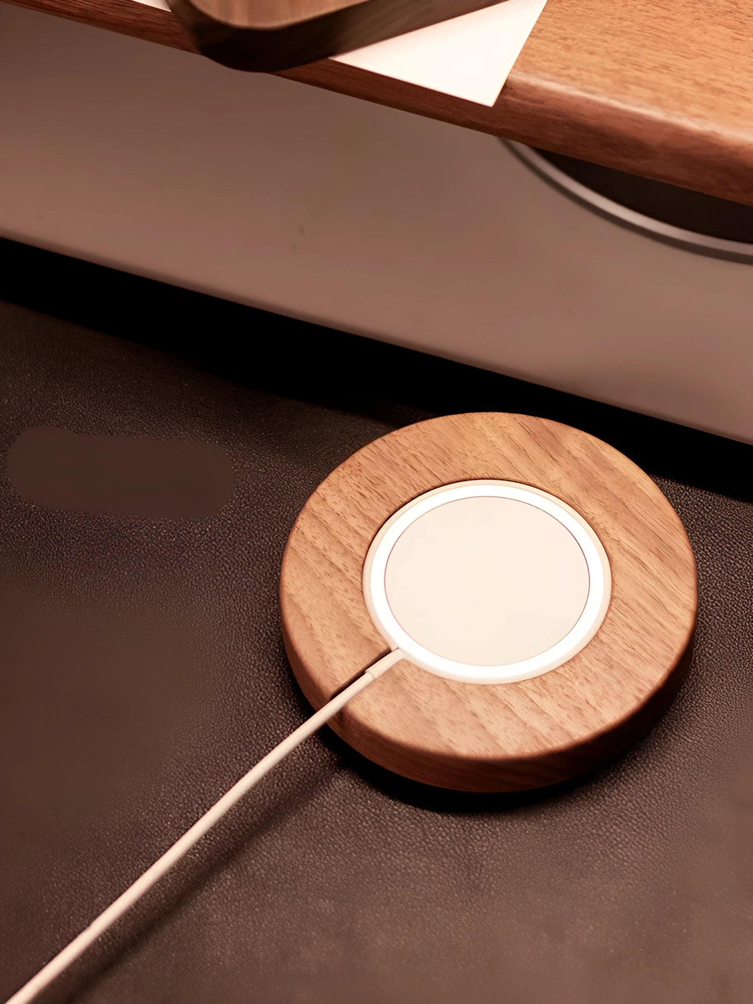 Walnut wood magnetic wireless charging base on desktop with round and square design options