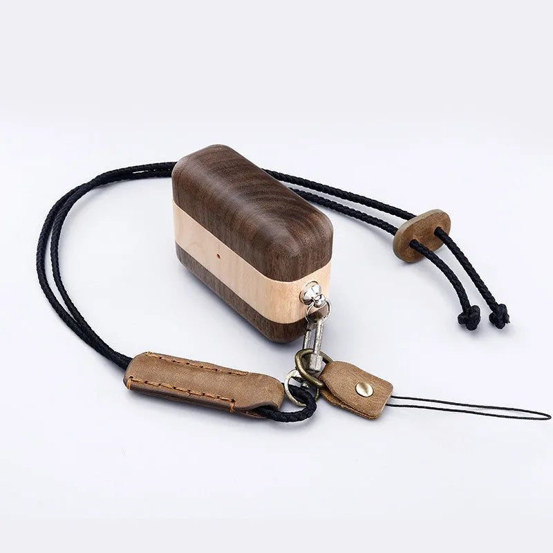 Solid wood Bluetooth earphone sleeve case for Apple AirPods in a natural wood finish.