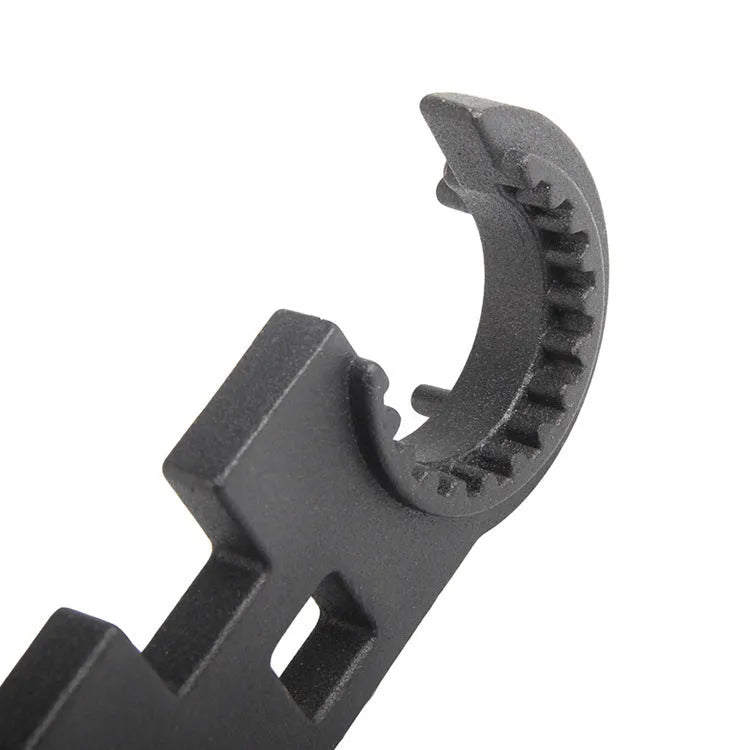 Black multi-function combination wrench for AR15 and M4 rifle maintenance