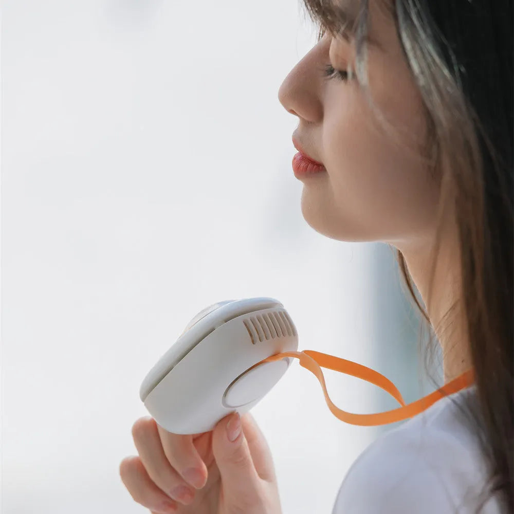 Hanging neck personal cooling fan with USB charging cable and animal-themed design in three colour options