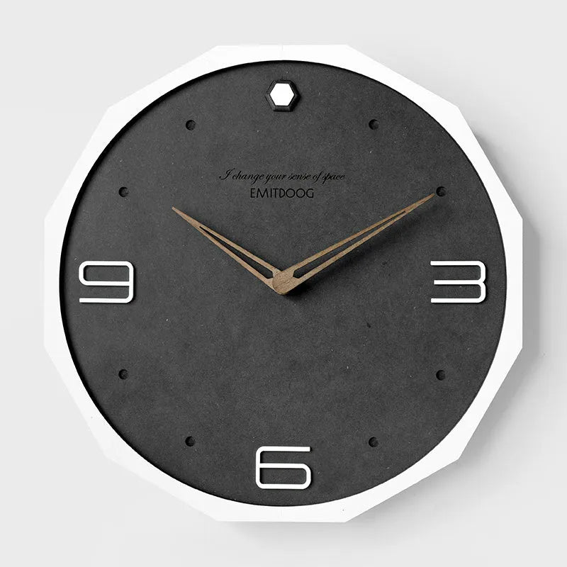 12 inch round Nordic style wall clock with a creative perforated metal face.