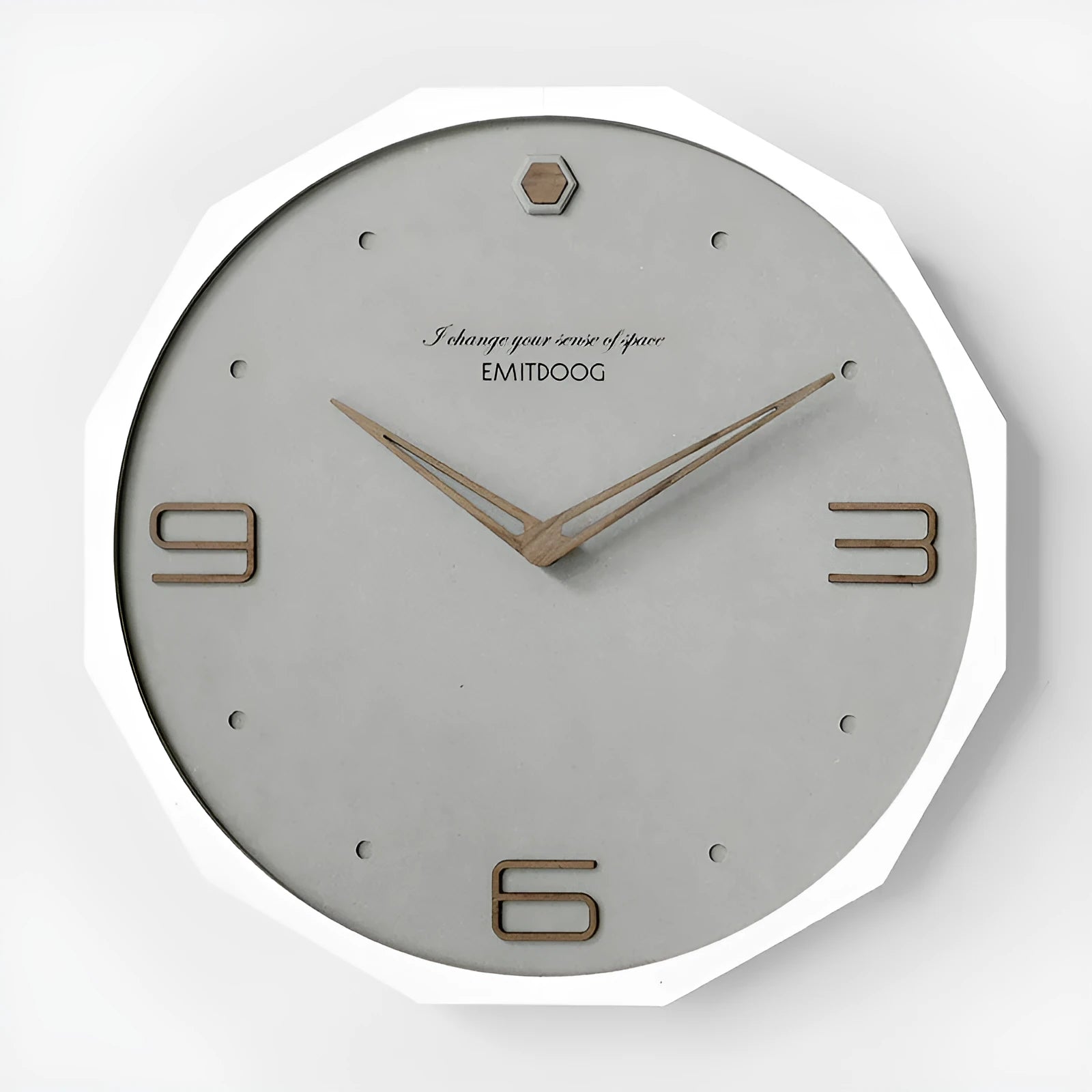 12 inch round Nordic style wall clock with a creative perforated metal face.