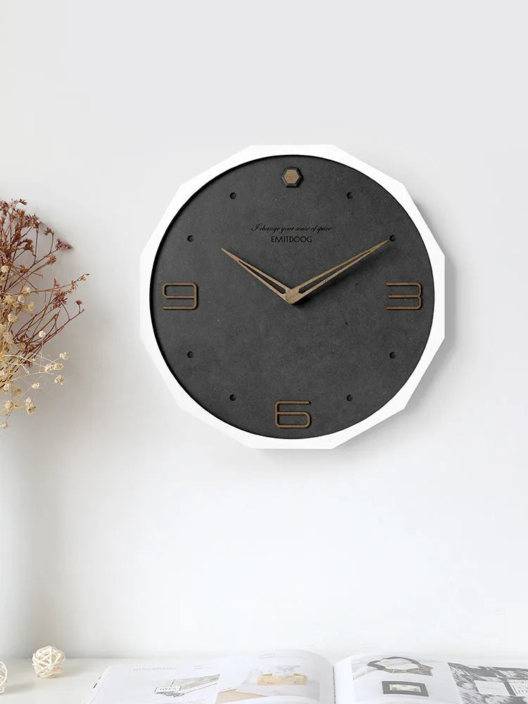 12 inch round Nordic style wall clock with a creative perforated metal face.