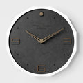 12 inch round Nordic style wall clock with a creative perforated metal face.