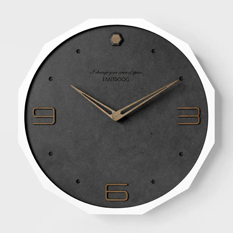 12 inch round Nordic style wall clock with a creative perforated metal face.