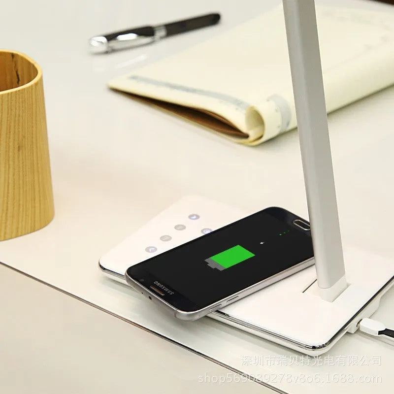 Wireless charging desk lamp with touch control in black or white colour with aluminium and plastic shade