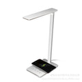 Wireless charging desk lamp with touch control in black or white colour with aluminium and plastic shade