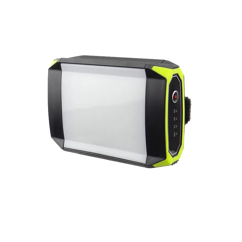 Green aluminium alloy rechargeable camping light with LED array and USB port.