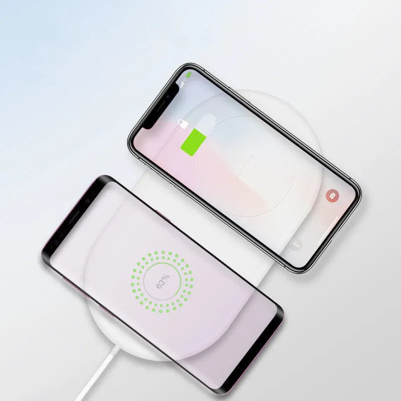 White dual wireless charging station for two mobile phones with LED indicator