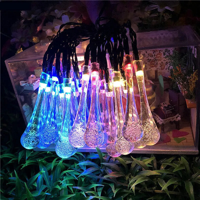 Solar-powered LED outdoor string lights with water drop pendants on a 6.5 metre cable