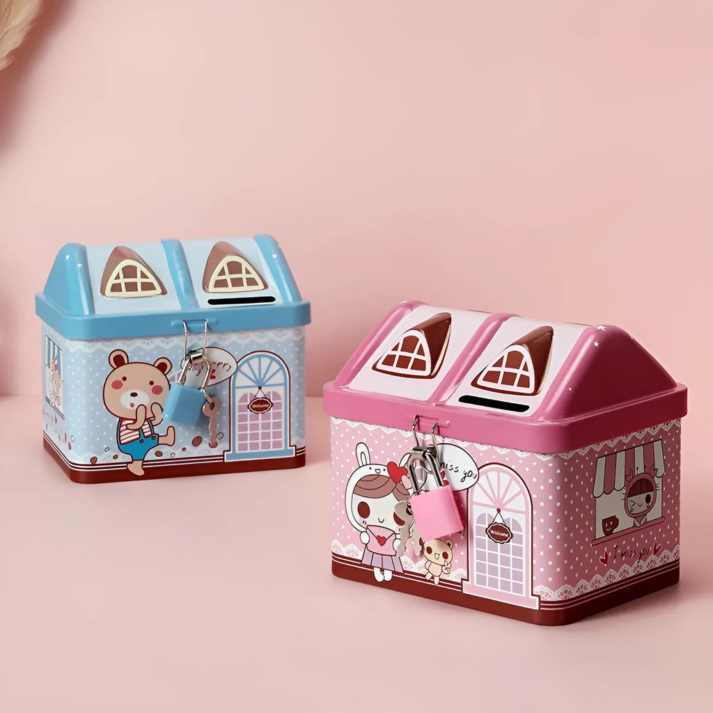 Blue house-shaped tinplate piggy bank with removable lid on wooden desk