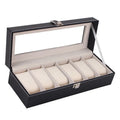 Black wooden watch display box with internal compartment for a single timepiece.