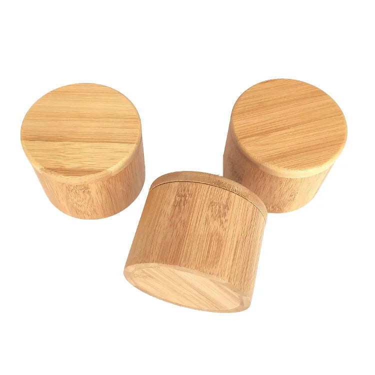 Natural bamboo seasoning storage box with a matching spoon, shown in single-compartment and pear-shaped designs.