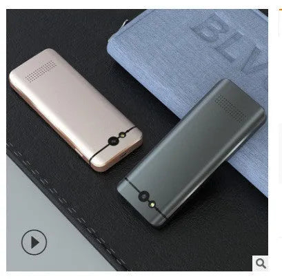 Gold and silver grey M9 WiFi translator device for group chat and photo translation on iOS.