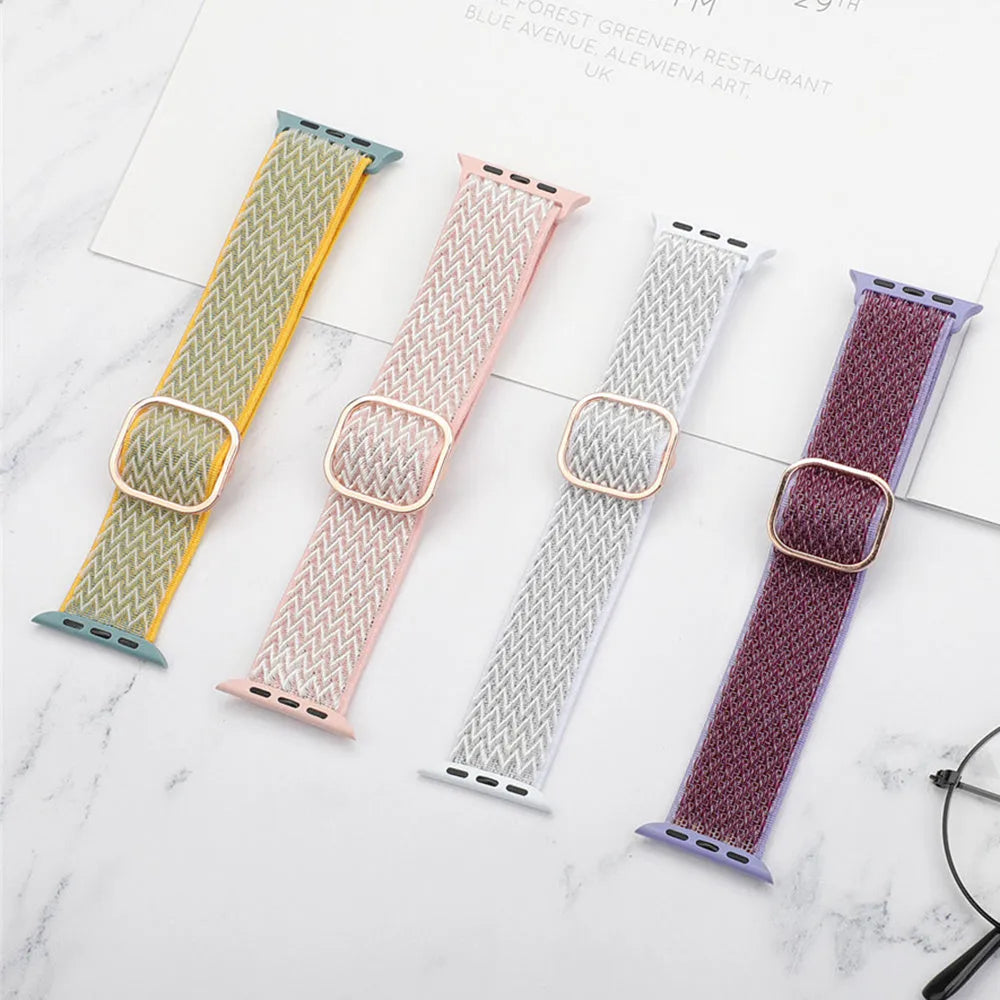Braided nylon elastic strap for Apple Watch in wave pattern, showing colour options on a wrist.