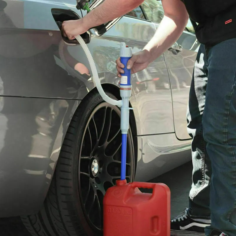 Blue and red manual hand siphon pump for transferring fuel, oil and water