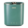 Green or white mini portable automatic washing machine for underwear and socks on a counter.