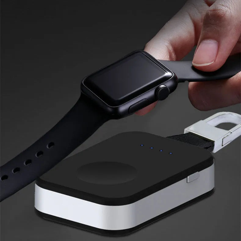 Black Apple Watch magnetic wireless charging power bank on a keyring, showing compact rectangular design.