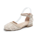 Women's apricot suede D'Orsay flats with ankle strap and low rubber sole.