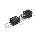 Mini silver metal woodworking lathe with carving knives on wooden surface