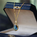 Geometric French retro necklace with electroplated gold colour finish on copper pendant