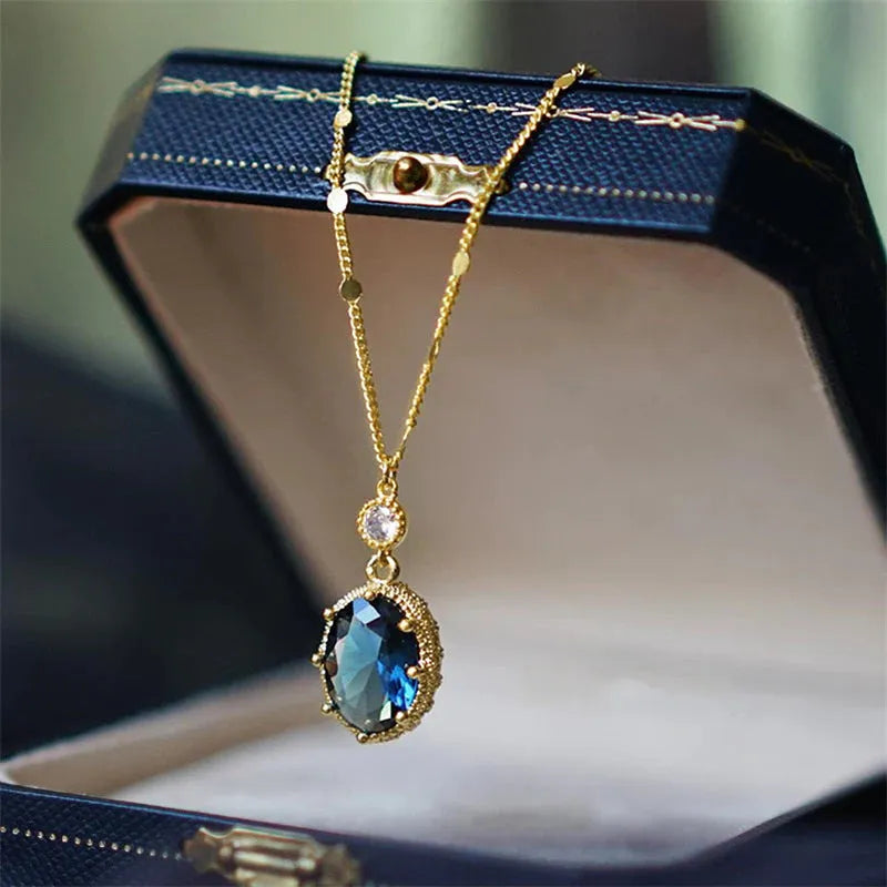Geometric French retro necklace with electroplated gold colour finish on copper pendant