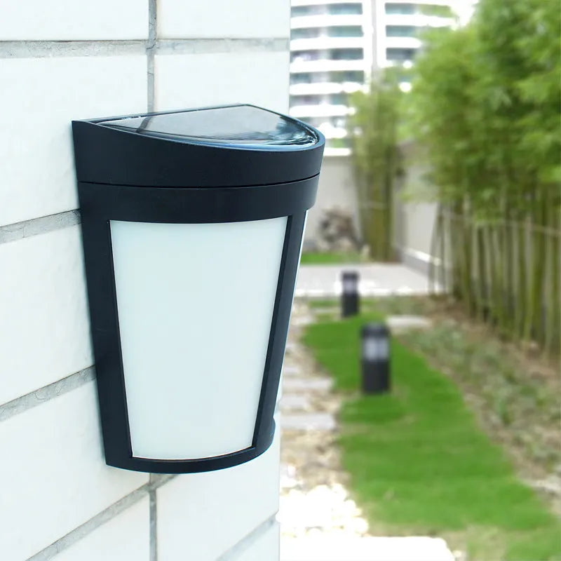 Solar-powered outdoor wall lamp with LED lights and sensor control for garden and courtyard illumination