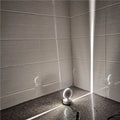 Modern aluminium bar-style wall spotlight with glass lens for multi-colour LED accent lighting.