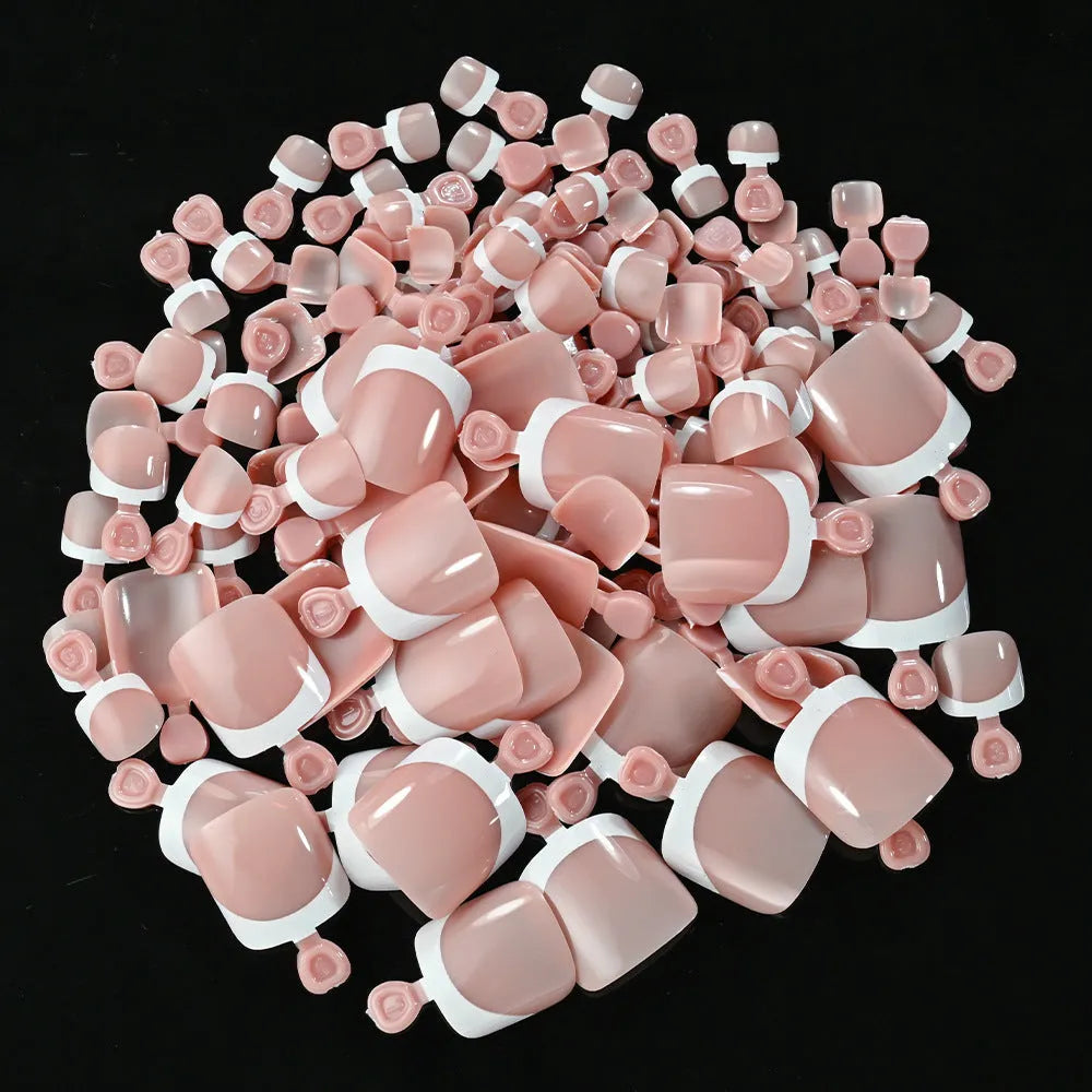 Open box showing 120 nude false toe nails with French white edges and a full-square short shape.