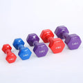 Bright colourful plastic-coated fitness dumbbells for home workouts and yoga exercises