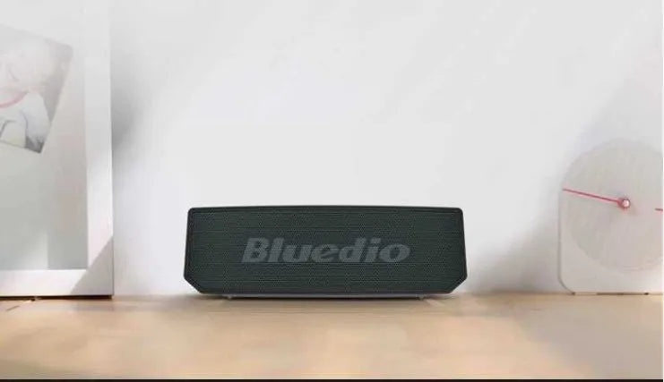 Black BS-6 cloud smart speaker with compact vertical design and Bluetooth connectivity