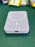 White magnetic wireless power bank with 5000mAh capacity showing creative design and compact dimensions