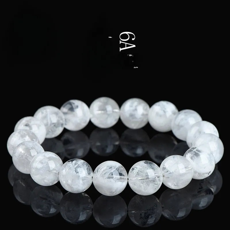 Women's bracelet with round blizzard snowflake crystal beads and traditional Ruyi Xiangyun decorative elements.
